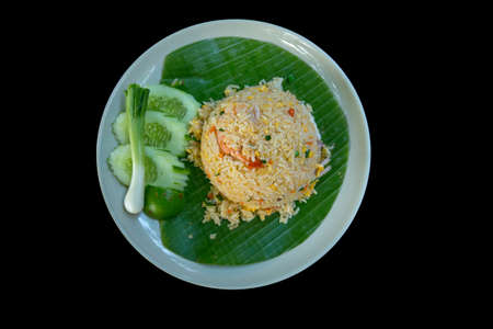 Asian food , Shrimp fried rice with vegetable on black backgroundの写真素材