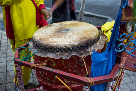 Bangkok, THAILAND - August 20, 2019: Drum for lions dance is hitting on the street walk in soi silom, Bangkokのeditorial素材