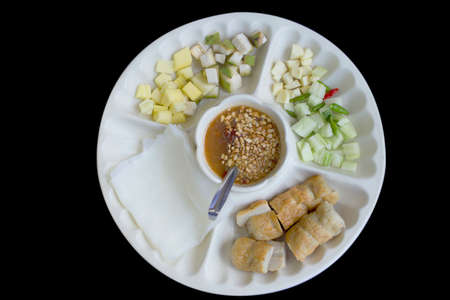 Vietnamese Meatball wrap (Nam Neung) ground pork, wrapped in rice paper, generous platter eat with sweet sauce.の写真素材