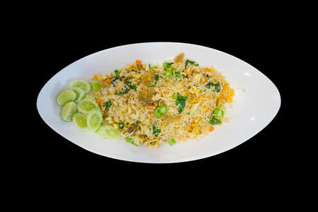 Crispy Fried Gourami fish with fried rice, die cut on white plate.の写真素材
