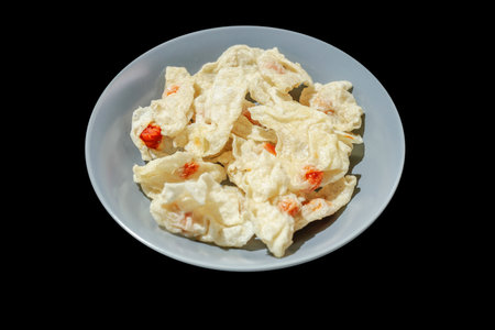 Use hand with stainless chopsticks picking up grilled roasted pork slice on korean barbecue brass panの写真素材