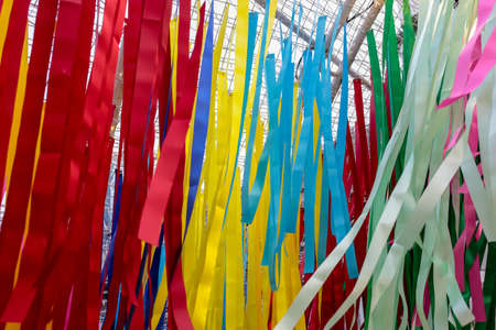 The texture of colored textile ribbons the colors of the rainbow