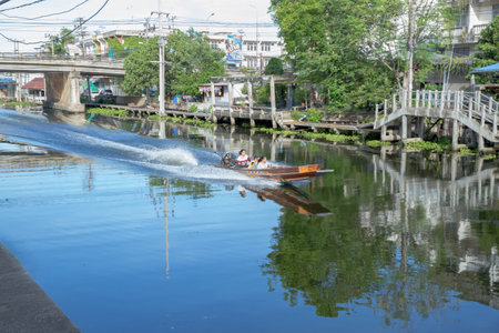 Samut Sakhon, THAILAND - September 12, 2020: Many People as tourists in the boat at Ban Phaeo distric, It is one of the most popular in Samut Sakhon.のeditorial素材