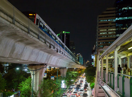 Bangkok, THAILAND - September 15, 2020: The journey home working life in Bangkok by walk, drive in the traffic jams or by BTS skytrain in the night time.のeditorial素材