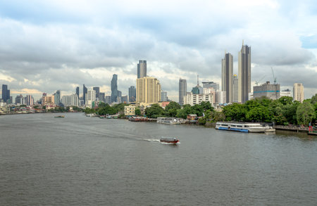 Bangkok / Thailand - July 7 2020: View from Chao Phraya Sky Park, Chao Phraya River close to Phra Pokklao Bridge in, Thonburi, Bangkok, Thailand. One of the most to travel around Bangkok.のeditorial素材