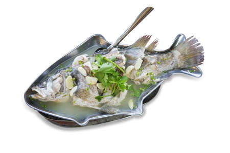 Die cut of Steamed Seabass with Lime and Chillies on white isolated.の写真素材