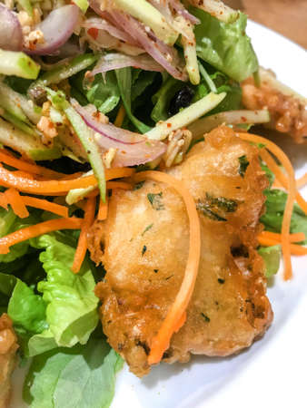 Glitter Syrup on fruit tarts on white isolatedの写真素材