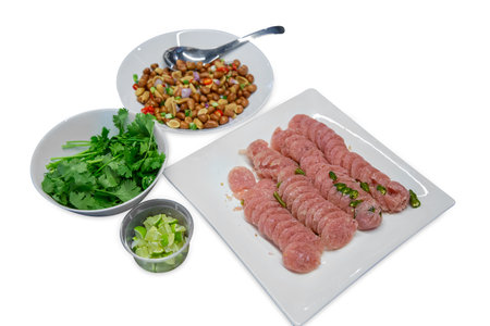 Die cut of Sliced sour pork, Peanuts and Coriander on white isolated.の写真素材