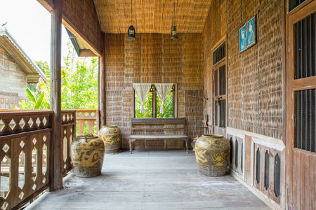 Nakhon Nayok, Thailand - April 29, 2023 : Thai house old style and woodwork beautiful traditional house design using hard wood and bamboo construction handcrafted atmosphere in ongkharak, Nakhon Nayok Province, Thailandのeditorial素材