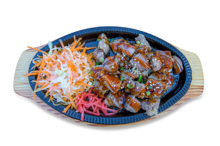 Die cut of Dice beef on the hot pan on white isolated.の写真素材