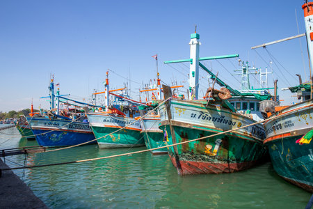 cha-am, THAILAND - December 31, 2023: Fishing boats moored at the pier in Cha am District....