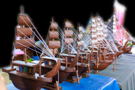 Die cut of Mini boat handicrafts on black isolated.の写真素材