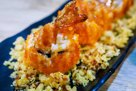 Salmon rolls, sushi with shrimp fillet, cream cheese, on white isolated.の写真素材