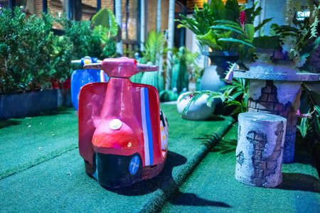 pink color of motorbike statue