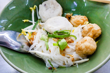 Dry noodles with fish balls, shrimp ballsの写真素材