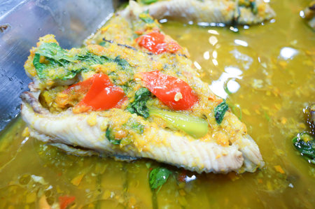 Sweet and sea bass in the market