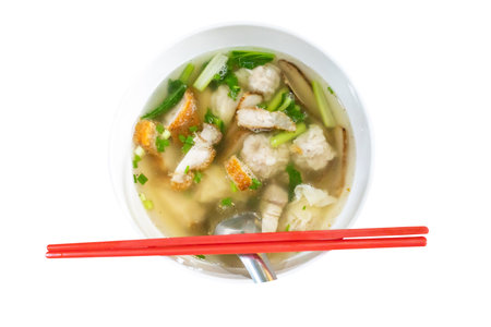 Die cut of Dumpling water or wonton soup on white isolated.の写真素材