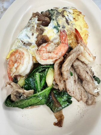 Stir-fried Rice Noodles with Soy Sauce and Pork on white isolated.の写真素材