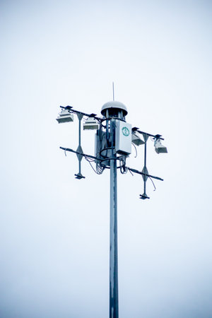 CCTV outdoor camera, building security guard with blue sky background