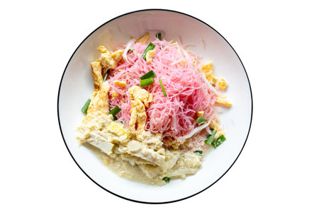 Die cut of Stir fried Noodle with Yentafo sauce Preserved soy bean dip topping on white isolated.