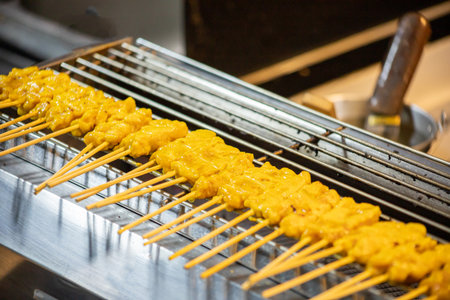 The Skewer Raw Pork Satay on the grill grateの写真素材
