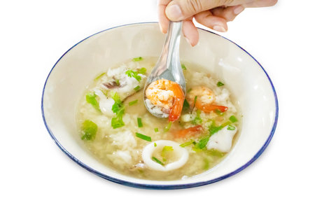 Die cut of Shrimp and squid rice porridge on white isolated.