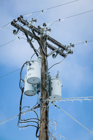 Glazed Powerlines After Winter Ice Storm, Snow and Frozen Rain, Iciclesのeditorial素材