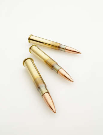 Large Caliber Bullets Catridges Isolated on White Wide Angleの写真素材