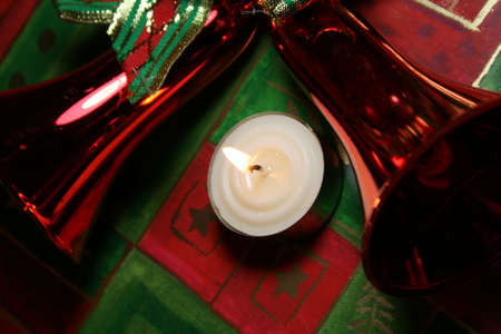 Candle and bellsの写真素材