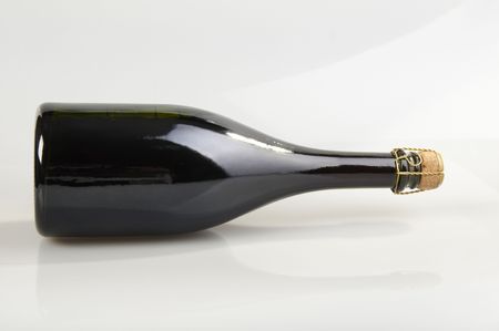 bottle of champagne on a white backgroundの写真素材