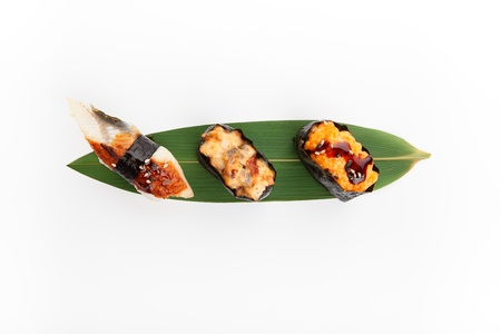 Sushi set on banana leaves on a white background  Top viewの写真素材