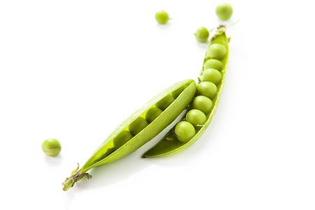 still life of fresh, ripe peas with peas on a white backgroundの写真素材