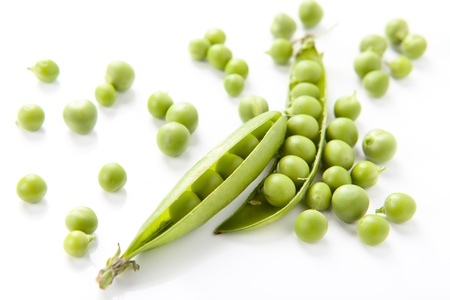 still life of fresh, ripe peas with peas on a white backgroundの写真素材