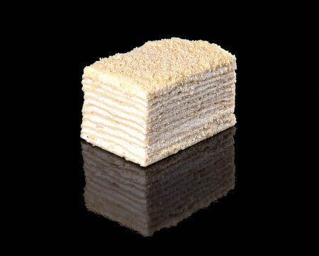 delicious cream cake on a black backgroundの写真素材