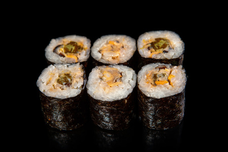 set of sushi rolls with mussels on black backgroundの写真素材