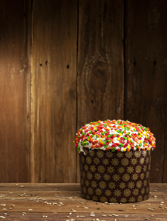 Delicious freshly baked Easter cake on a wooden background