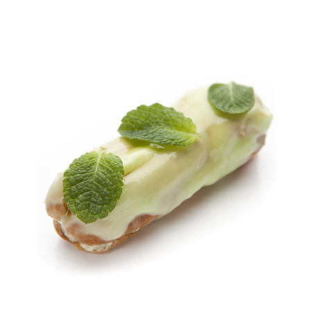 exquisite cream dessert eclair on a white background
