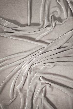 luxurious and soft waves of gray velvet backgroundの写真素材