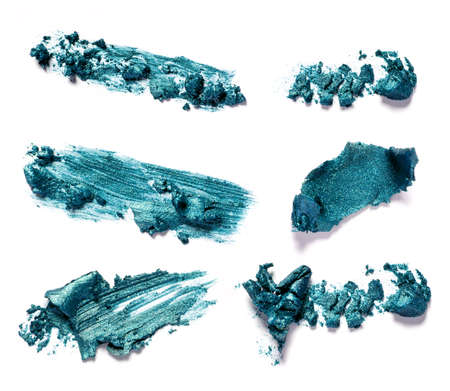 Collection of smear crushed cosmetic products on a white backgroundの写真素材