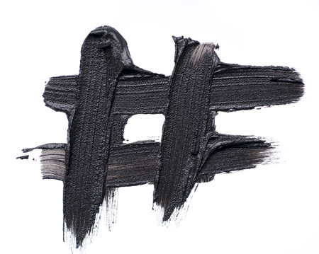 Black smear of cosmetic products on a white backgroundの写真素材