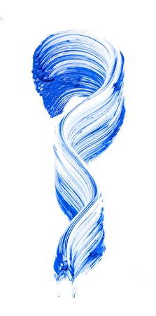 cosmetic products smear paint of blue mascara on a white backgroundの写真素材