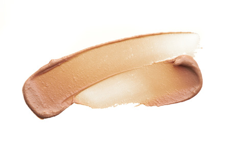 smear paint of cosmetic products on a white backgroundの写真素材