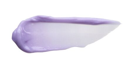 Purple makeup smear of lip gloss isolated on white background. Purple cream texture isolated on white backgroundの写真素材