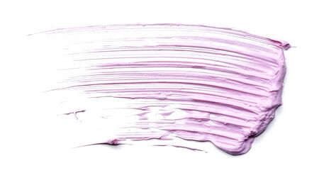 Pink strokes and texture mascara or acrylic on a white backgroundの写真素材