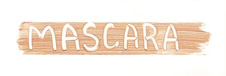 Gently beige strokes and texture of makeup foundation or acrylic paint isolated on white backgroundの写真素材