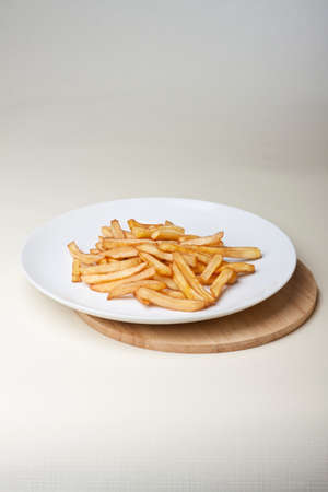 chips on a white plateの写真素材