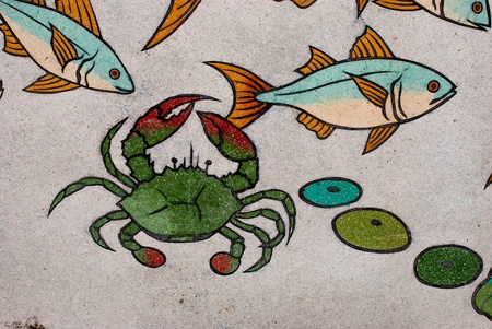 Painted fish on the wall Temple Bangnon in Ranong,Thailandの写真素材