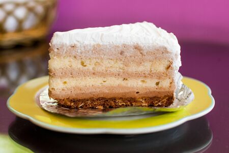 Cake in a plate on the tableの写真素材