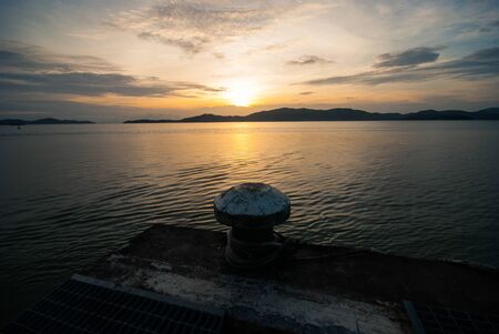 Bollard on concrete platform at the harborの写真素材