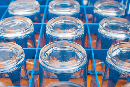 glass in the Blue container on the tableの写真素材